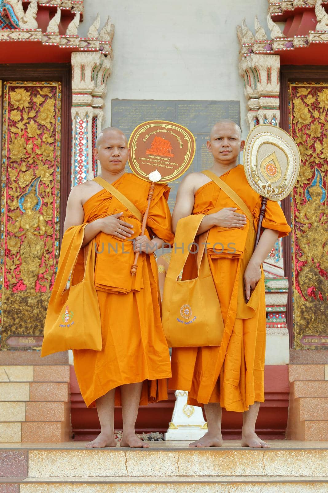 ordination ceremony that change the Thai young men to be the new monks by geargodz