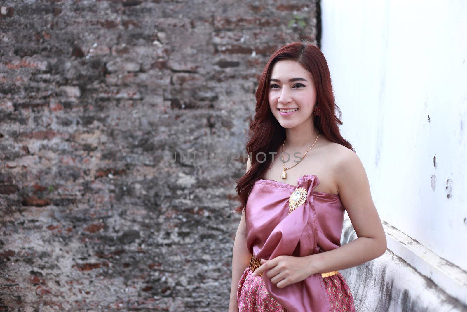 Female in Thai traditional dress at  historical park