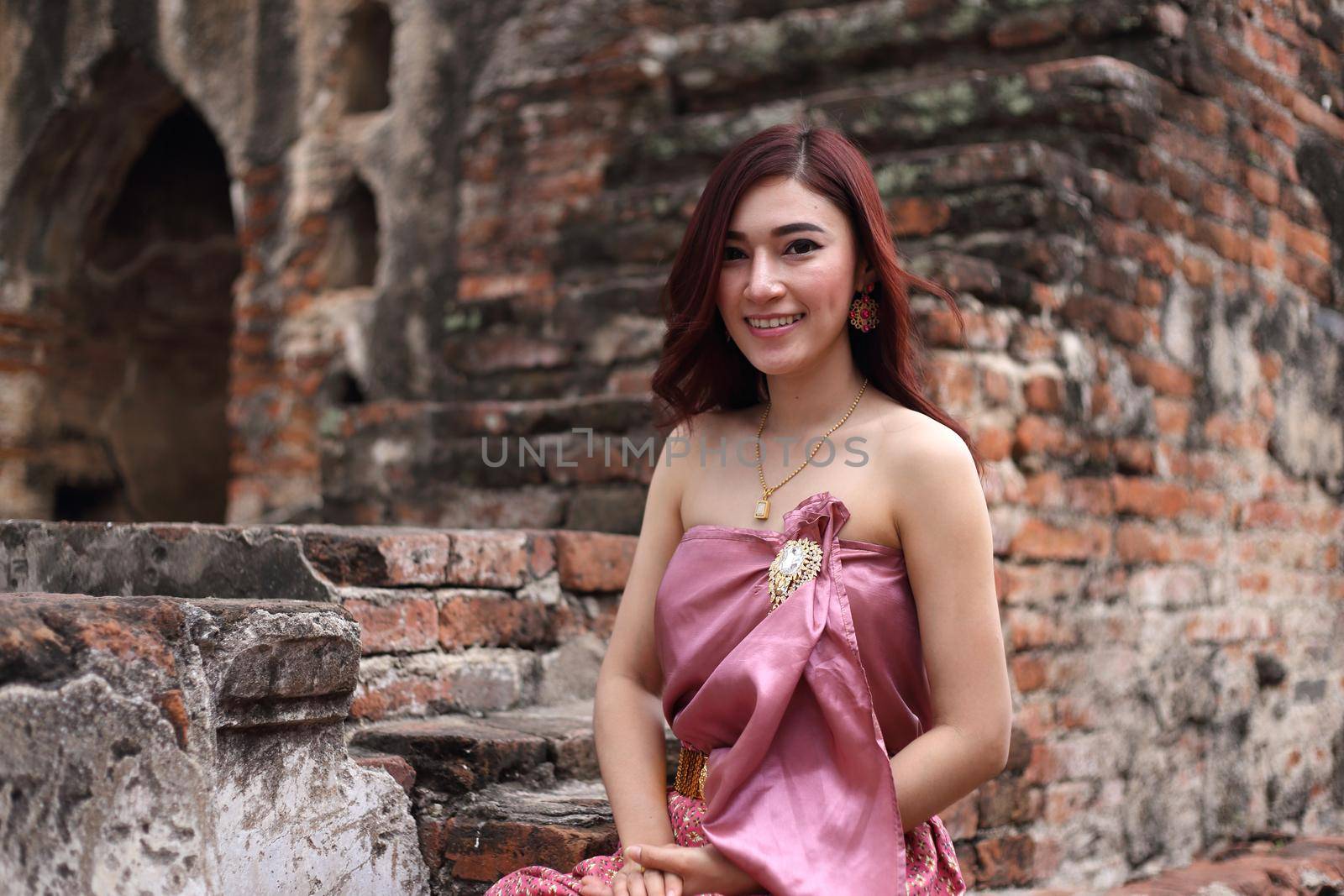 Female in Thai traditional dress at  historical park