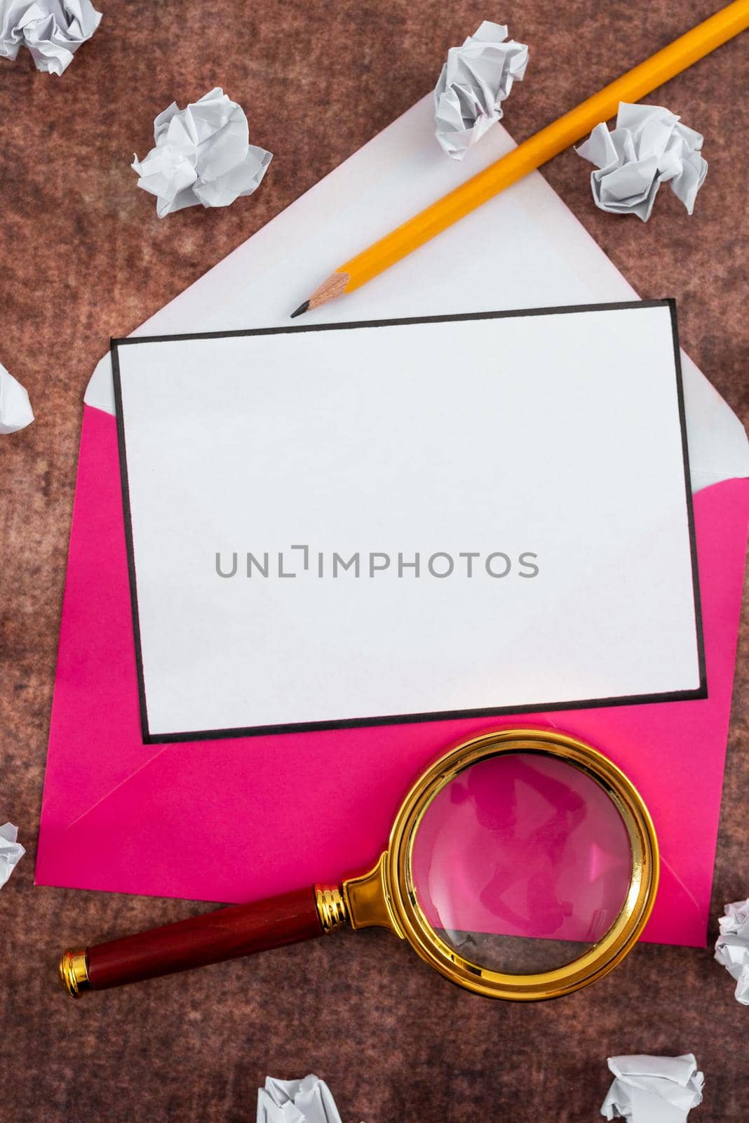 Blank Letter With Envelope, Pencil, Magnifying Glass And Surrounded With Crumpled Papers. It Is Representing Crucial Plans And New Ideas For Growth Of The Business. by nialowwa