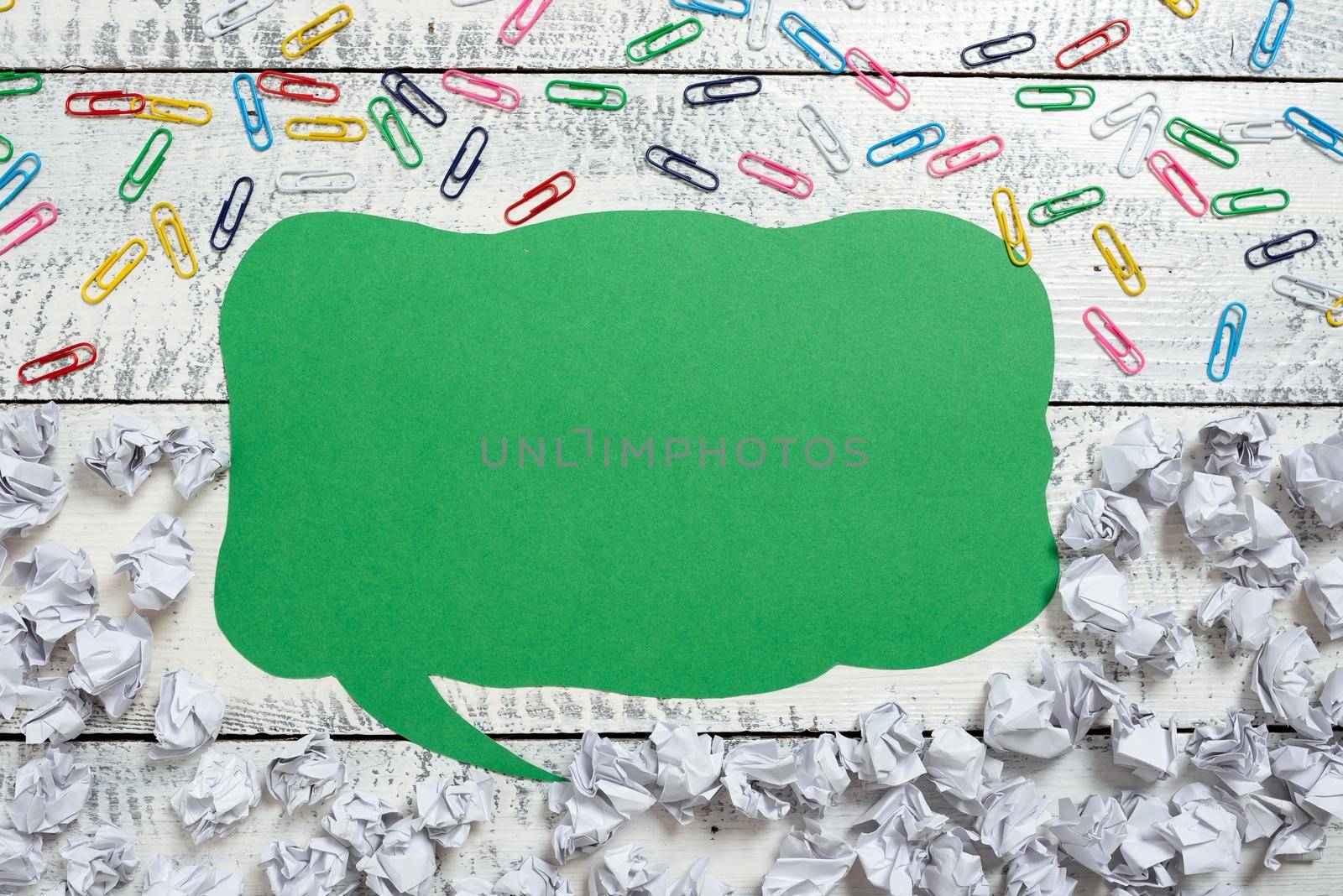 Speech Bubble With New Idea Divided On Half With Paper Wraps And Paperclips