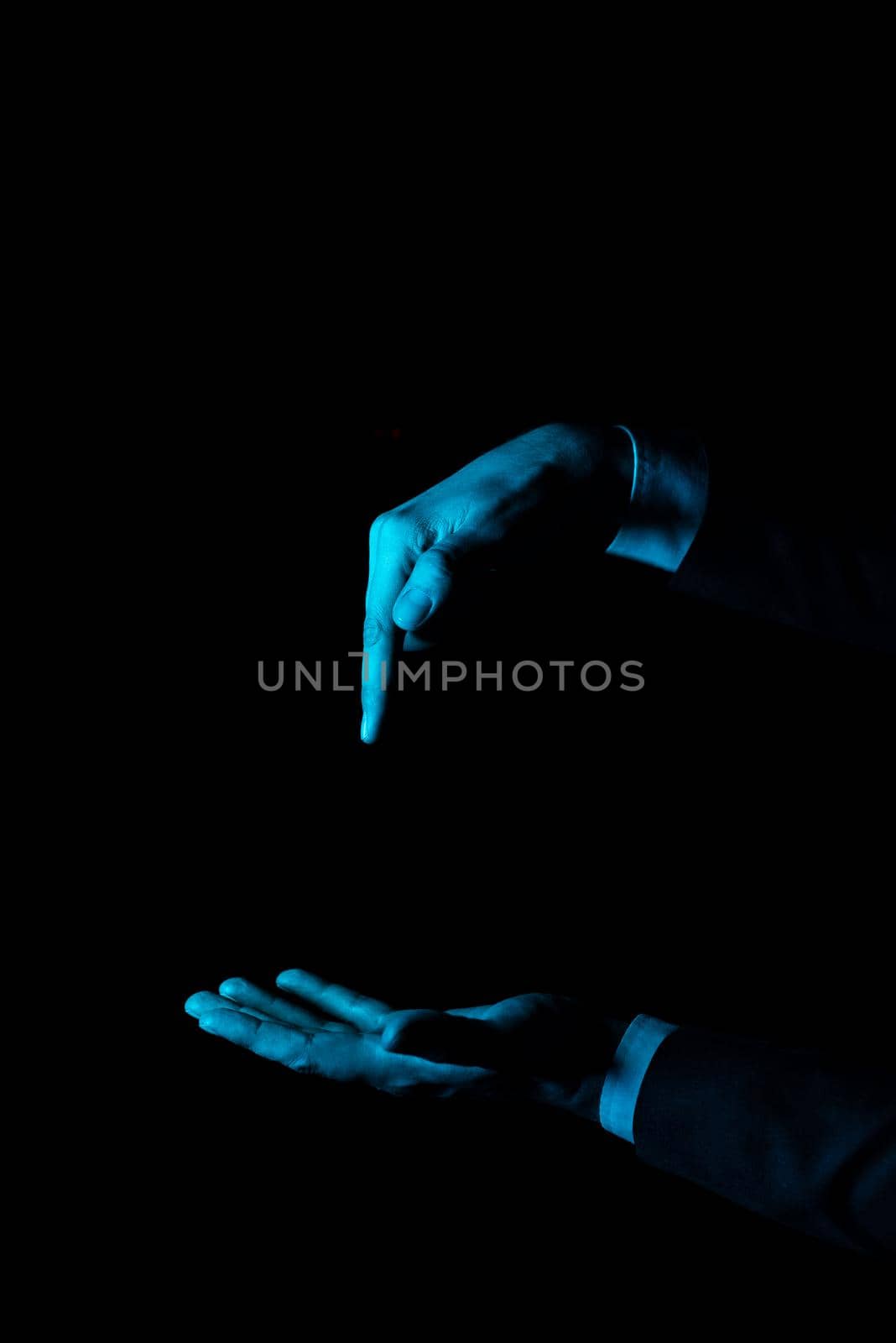 Businessman In Suit Pointing With One Finger On Important Message.