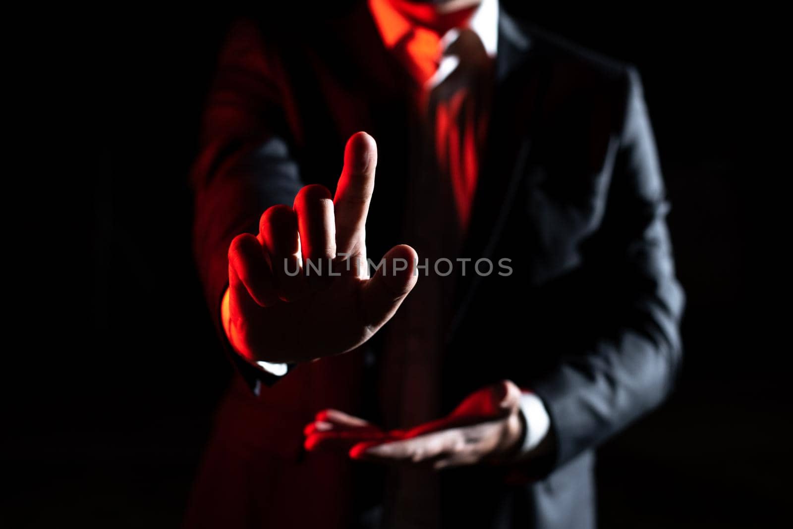 Businessman Pointing Important Infortmations With One Finger. Hand Presenting Crutial Announcement. Man Showing Recent Updates. Executive Displaying Critical Messages. by nialowwa