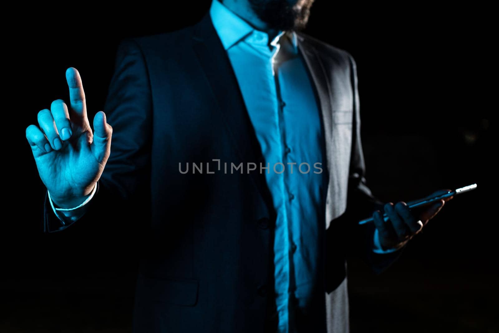 Businessman Pointing Important Infortmations With One Finger.