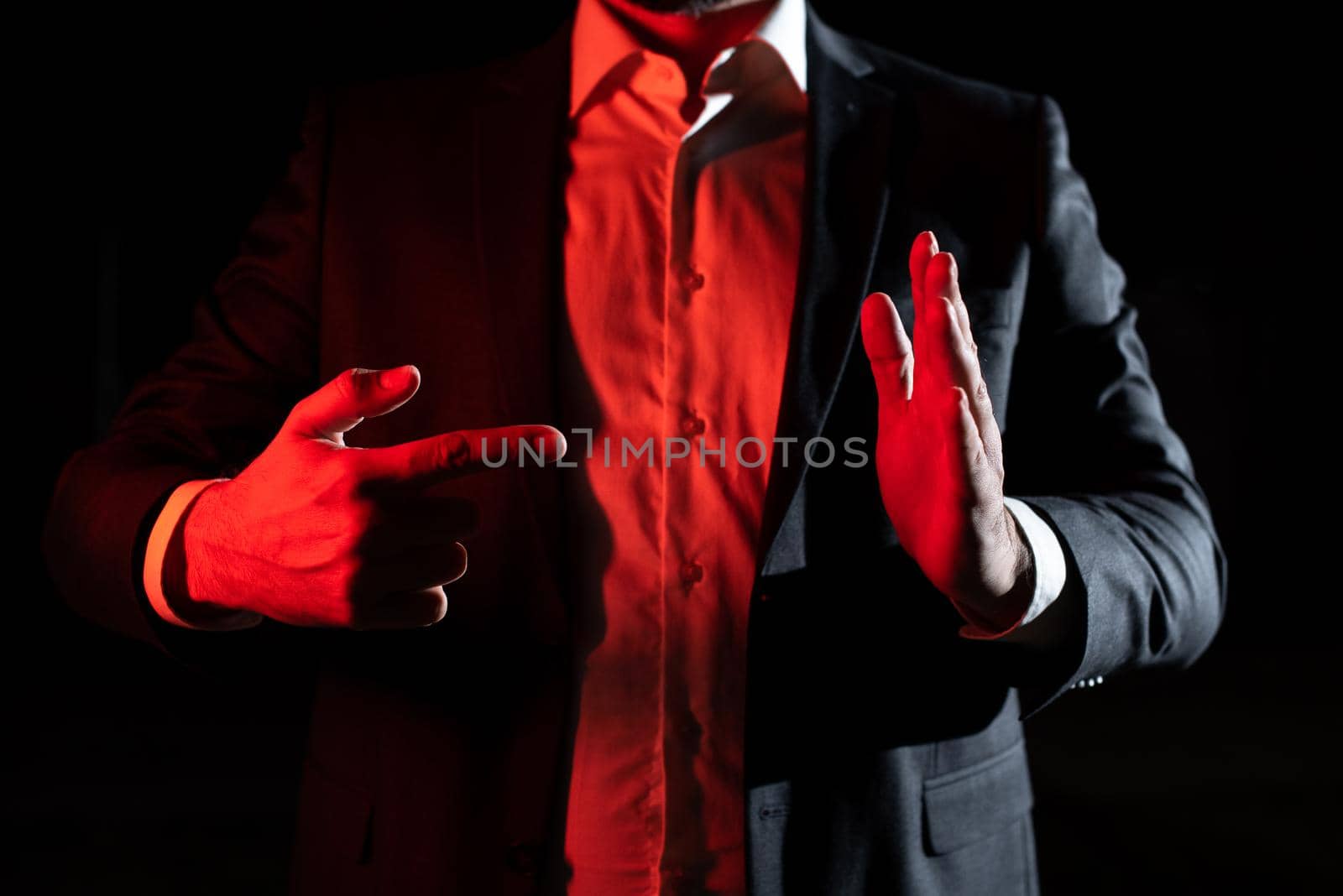 Businessman Pointing Important Infortmations With One Finger. Hand Presenting Crutial Announcement. Man Showing Recent Updates. Executive Displaying Critical Messages. by nialowwa