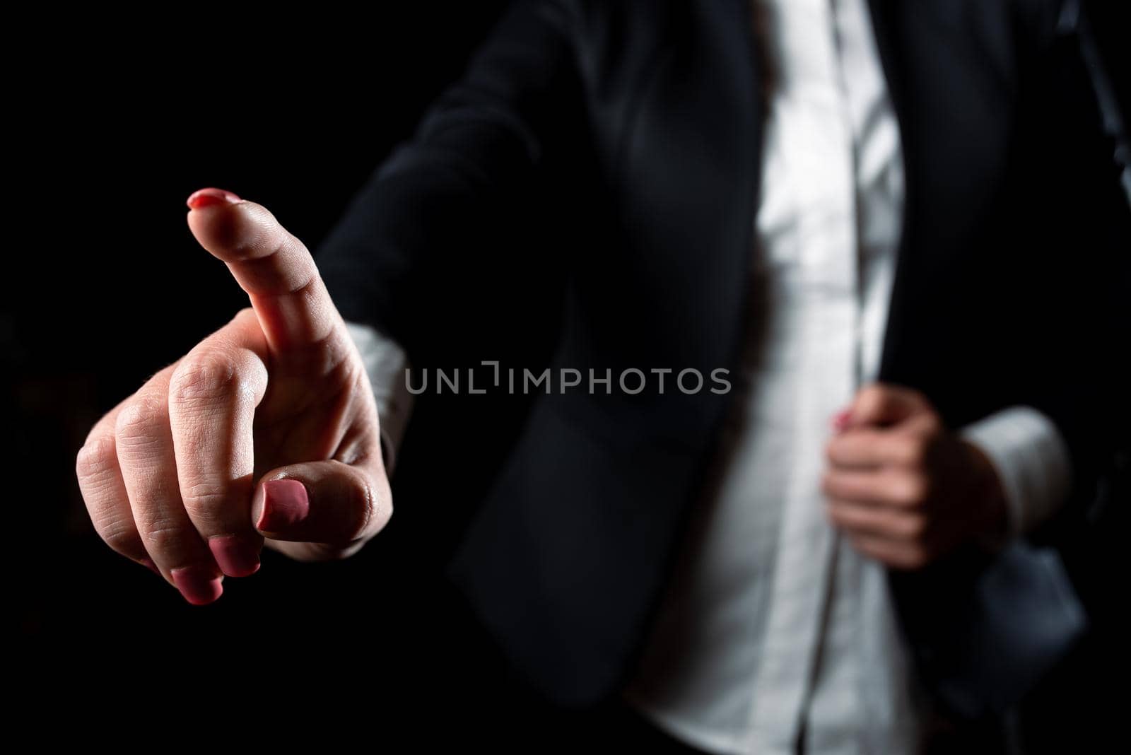 Businesswoman Pointing Important Infortmations With One Finger.