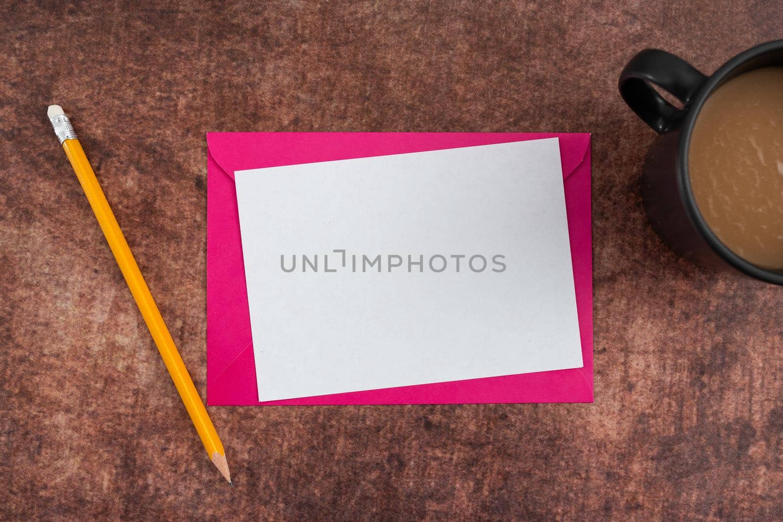 Blank Letter With Envelope, Pencil And Coffee Mug Placed On Wooden Table Presenting Crucial Message. It Is Representing Important Information And Strategies For Business. by nialowwa