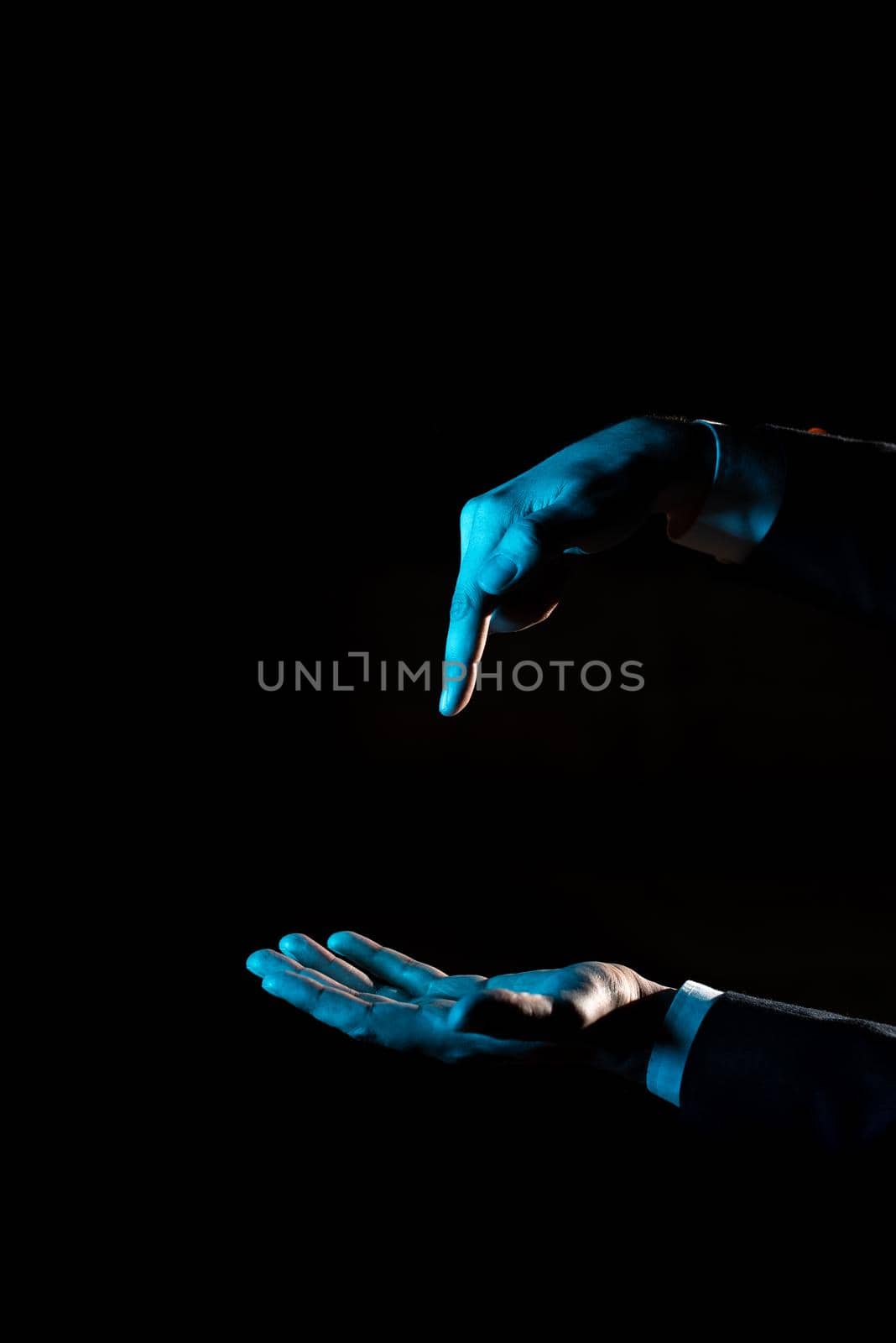 Businessman In Suit Pointing With One Finger On Important Message.