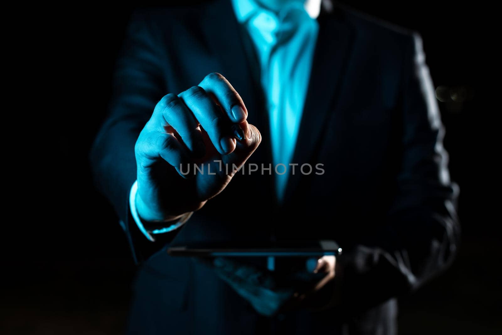 Hand With Pen Pointing Important Infortmations With Other Holding Tablet. Businessman Presenting Recent Updates. Executive Displaying Critical Messages. by nialowwa