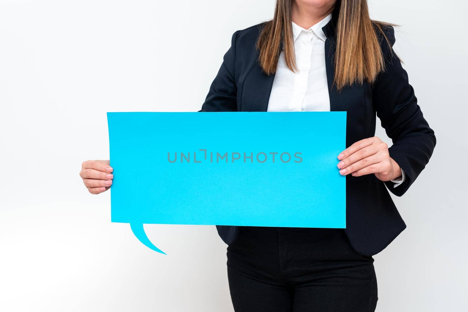 Businesswoman Holding Speech Bubble With Important Messages.