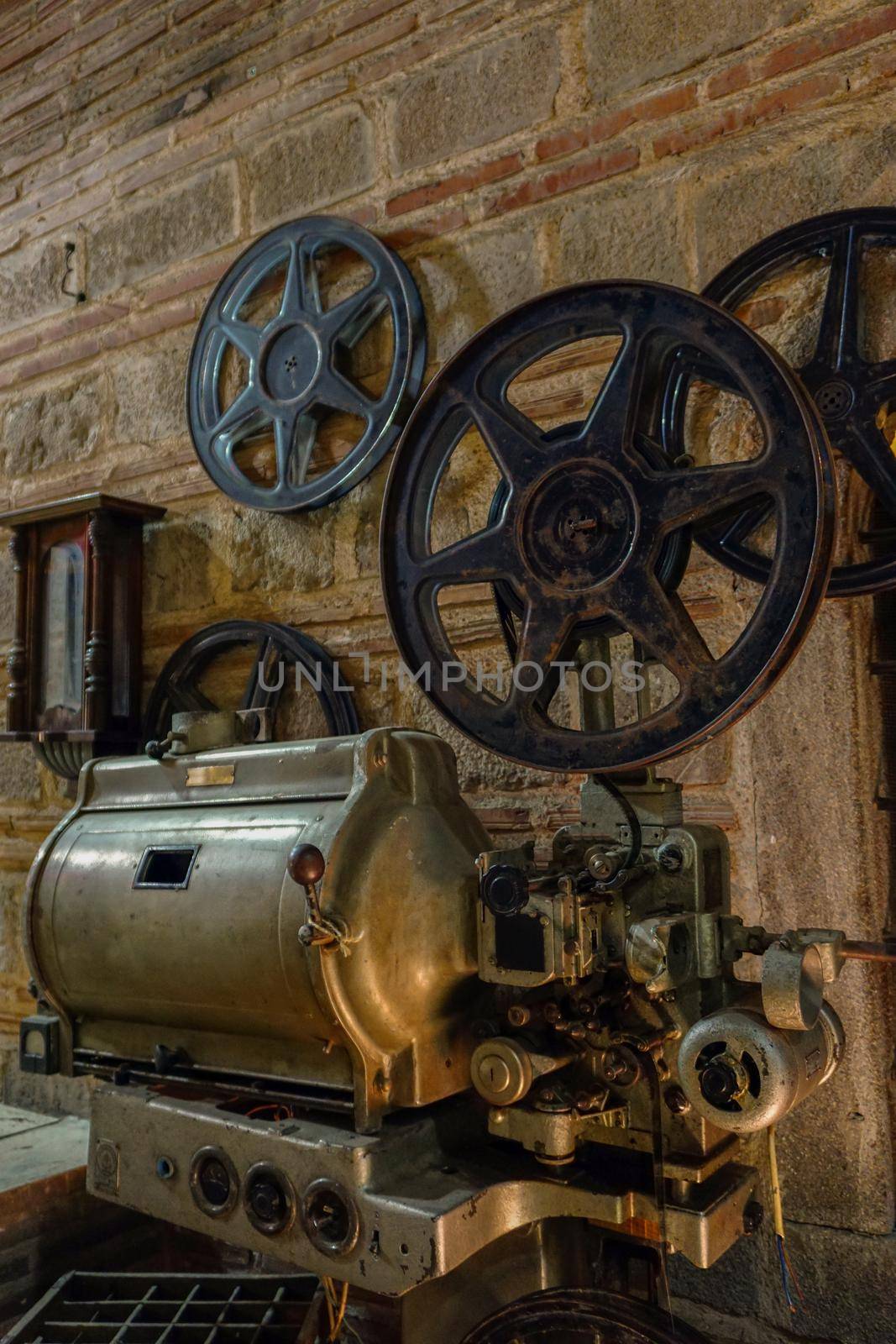 Vintage cinematograph machine close up view by tasci
