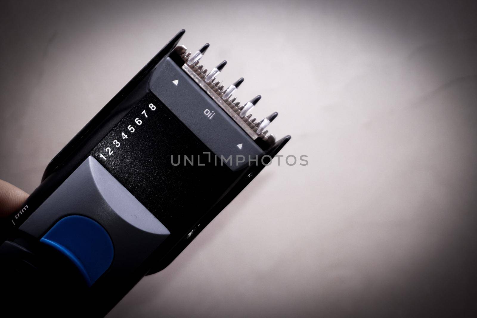 Hair trimmer charge and maintenance close up view by tasci