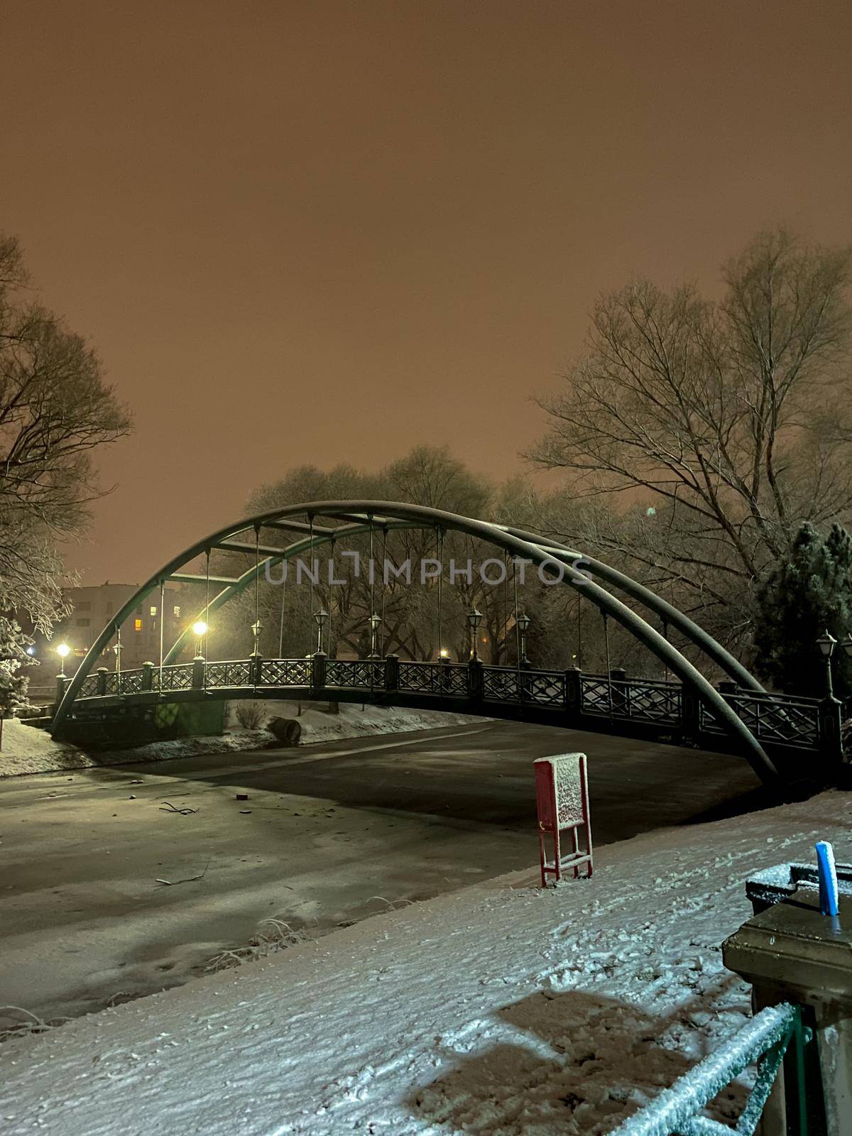 Frozen Porsuk river in Eskisehir at Kanlikavak park at night snow scenes