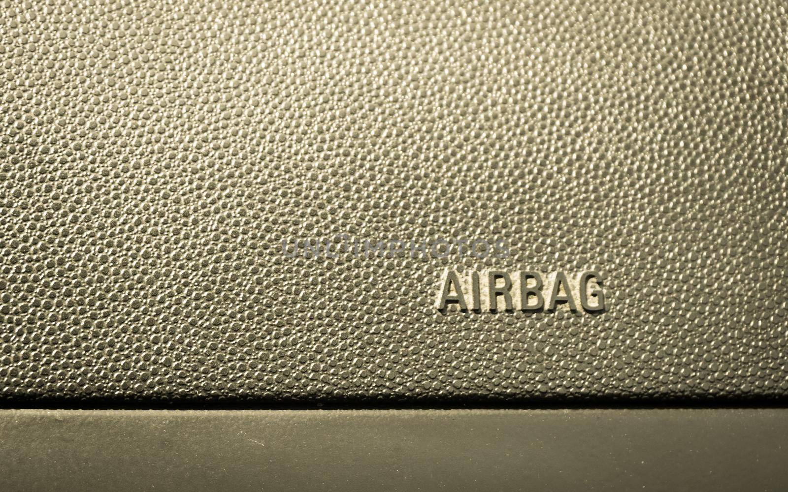 Passenger airbag on car console close up view