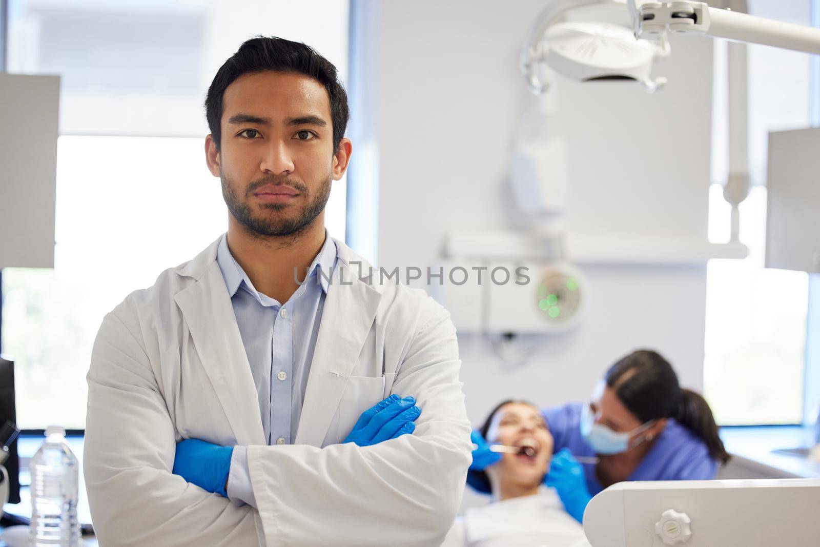 Nobody does dentistry like I do. Portrait of confident a young dentist working in his consulting room
