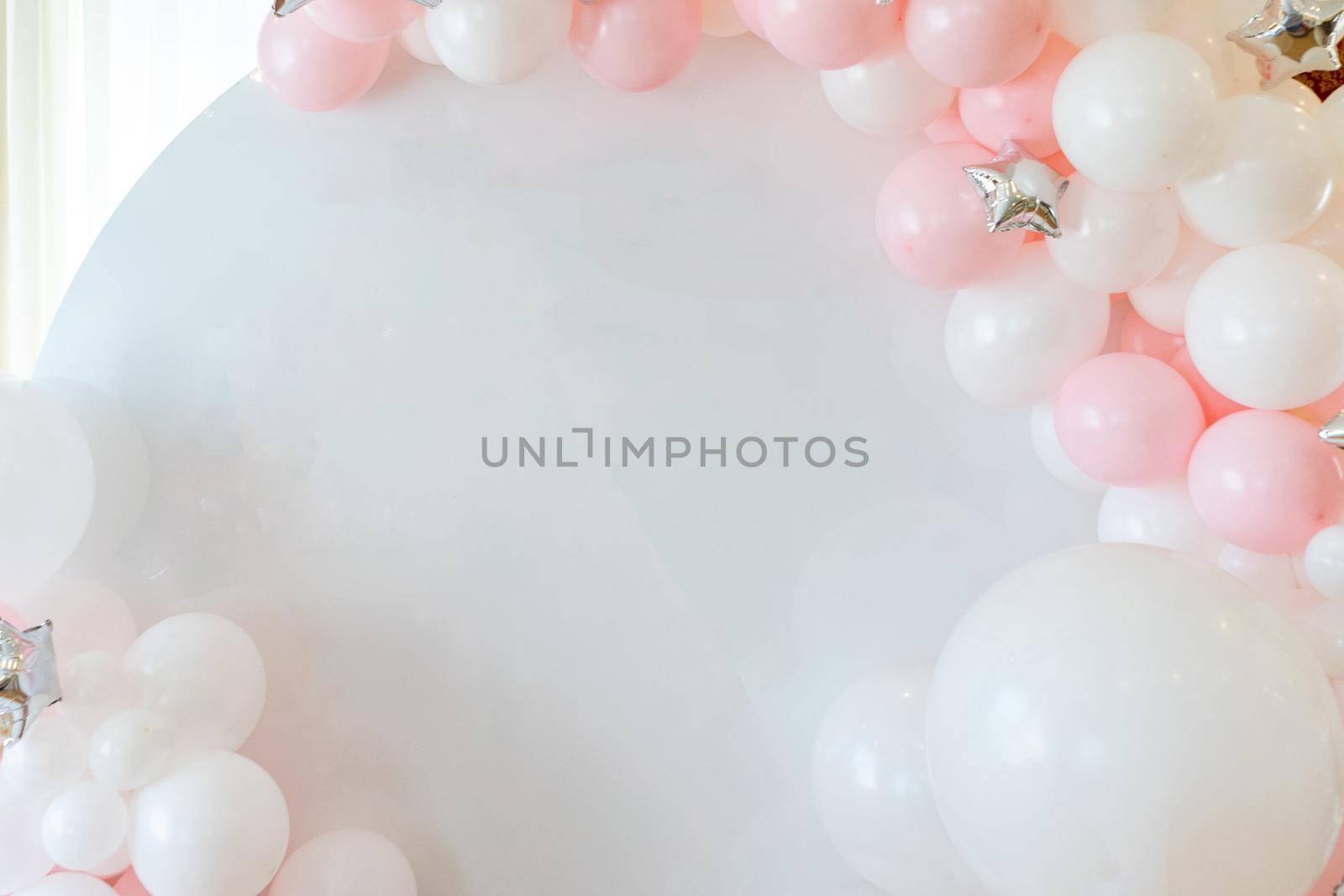 frame on a white background of pink and white balloons.