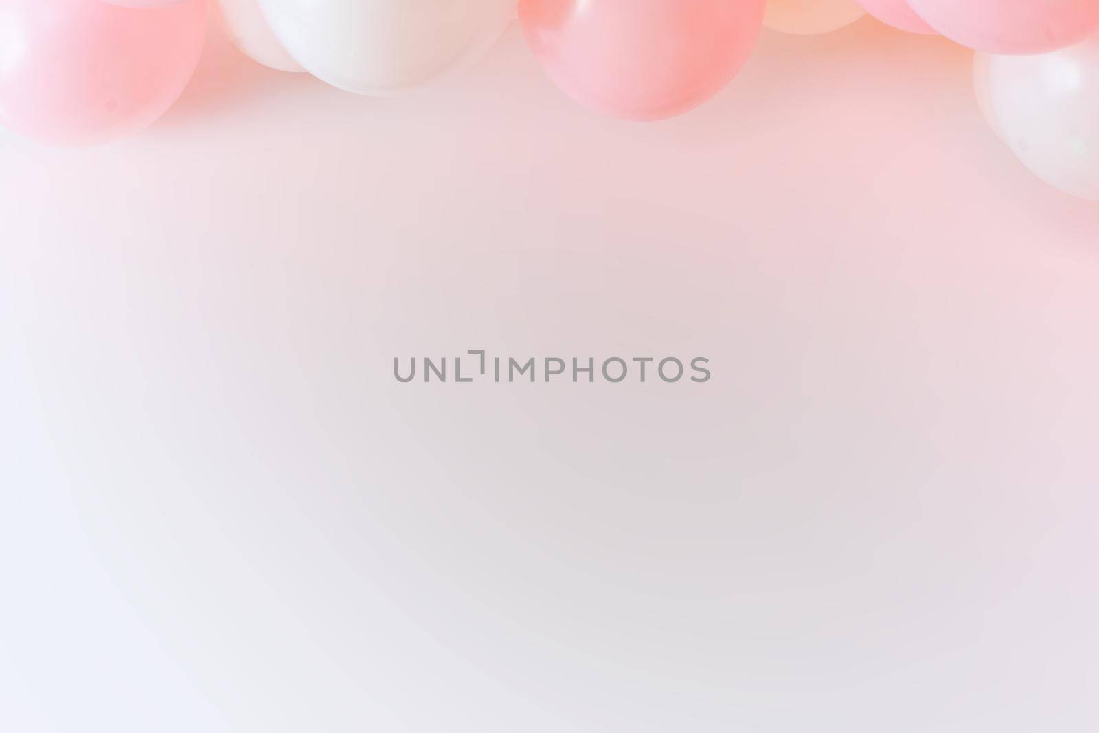 Light pink grafitti background with white and pink balloons by Serhii_Voroshchuk