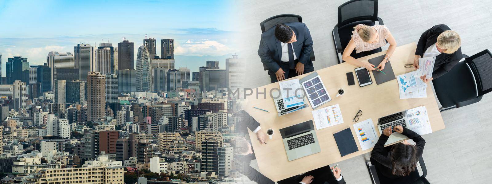 Business people group meeting shot from top widen view in office . Profession businesswomen, businessmen and office workers working in team conference with project planning document on meeting table .