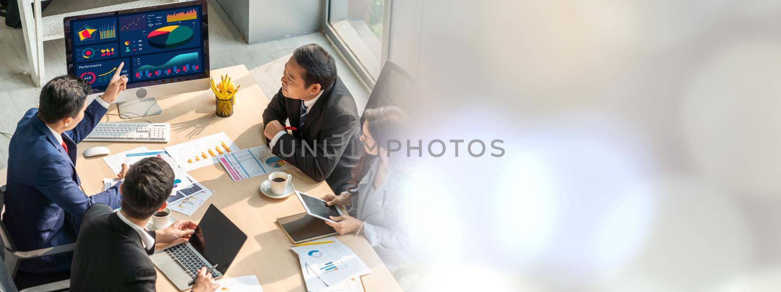 Smart businessman and businesswoman talking discussion in widen group meeting by biancoblue