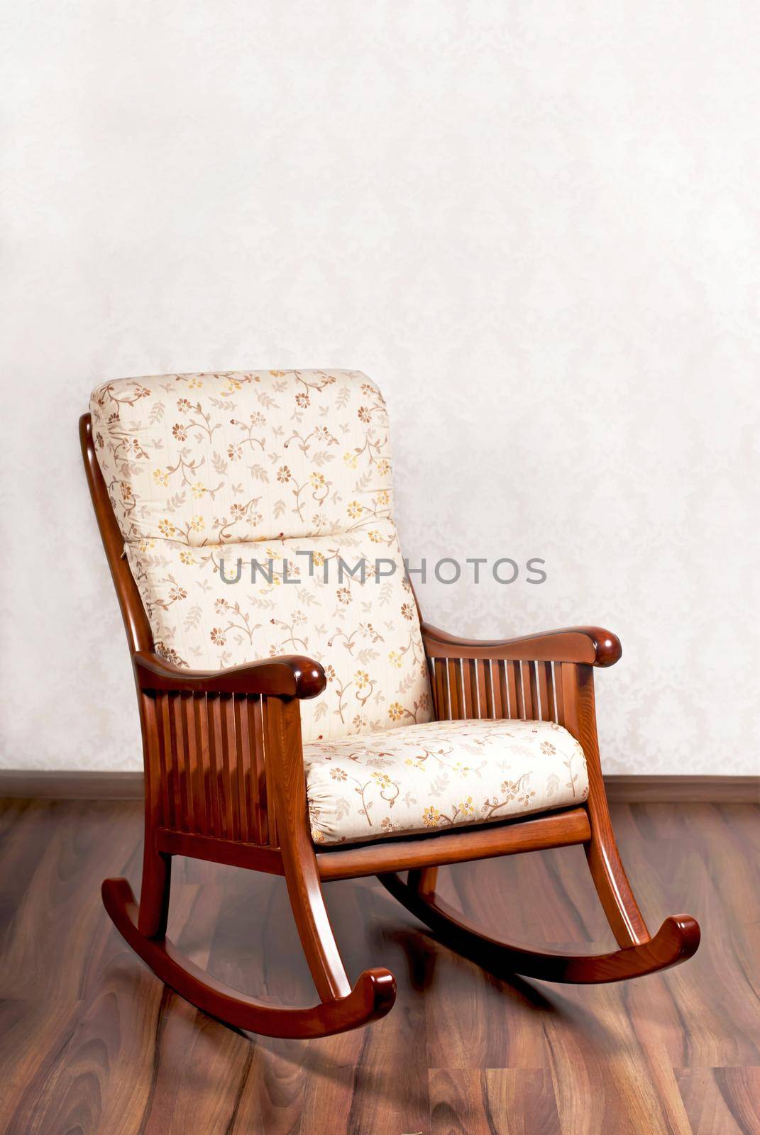 modern rocking chair near a light wall