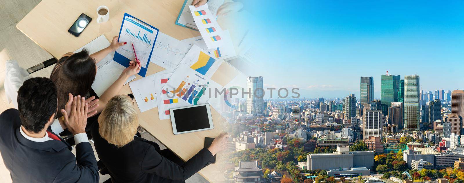 Business people group meeting shot from top widen view in office . Profession businesswomen, businessmen and office workers working in team conference with project planning document on meeting table .