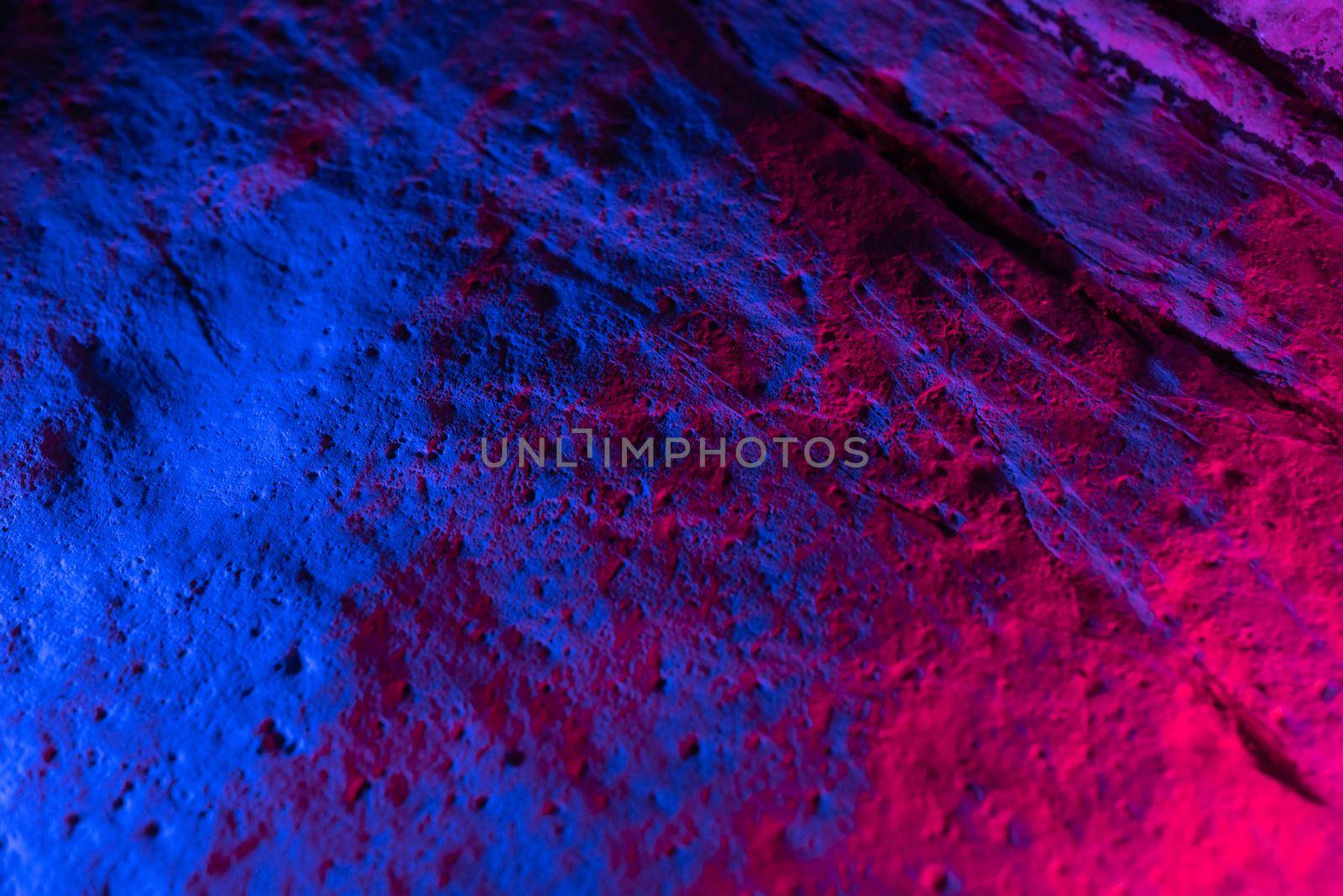 neon texture of granite white rock in bright neon lighting