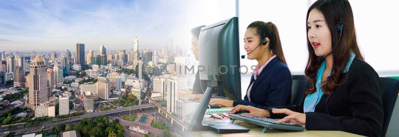 Business people wearing headset working in office in widen view by biancoblue