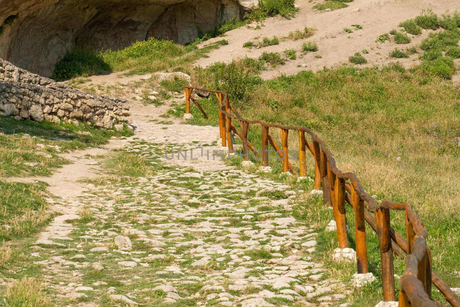 Ancient road cave bakhchisaray chufut city crimea medieval street old, for sunny building for tourism from settlement tree, wall landmark. Town ruins moutain,