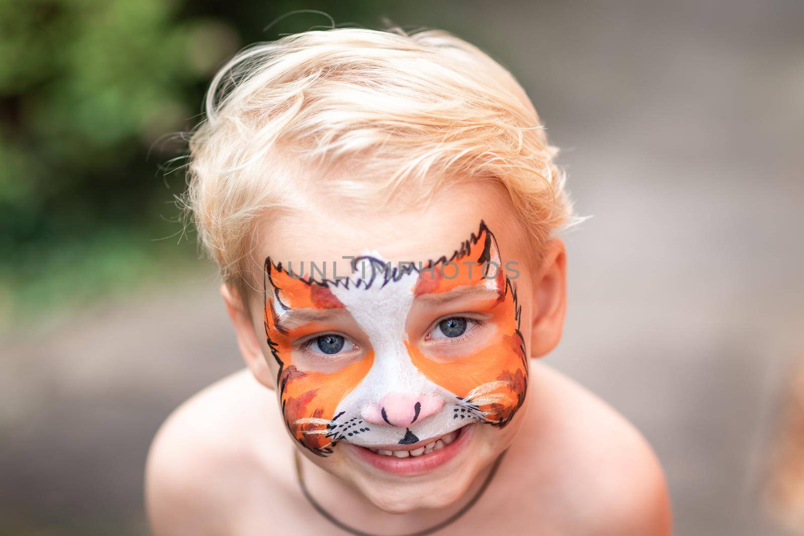 Cute little boy with his face painted by Len44ik
