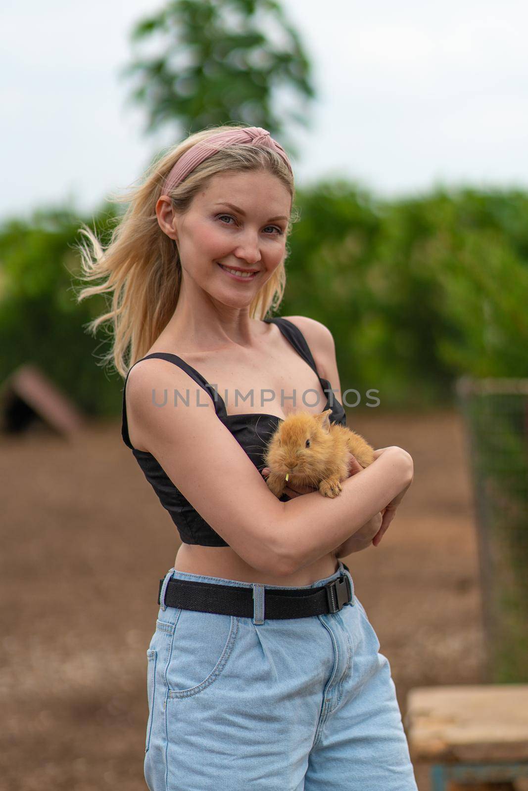 Rabbit girl holding bunny easter cute furry friendship attractive pet, for hands woman for pretty for farm domestic, outdoor adorable. Ears face, by 89167702191