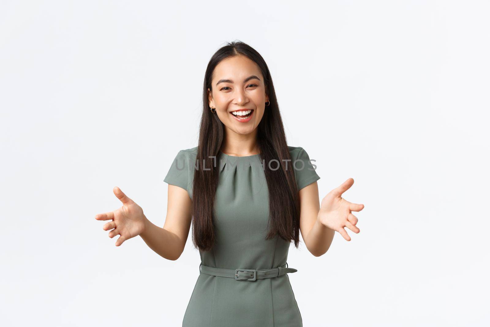 Small business owners, women entrepreneurs concept. Happy attractive asian businesswoman, company CEO reaching hands forward and smiling friendly as inviting investors, greeting clients by Benzoix