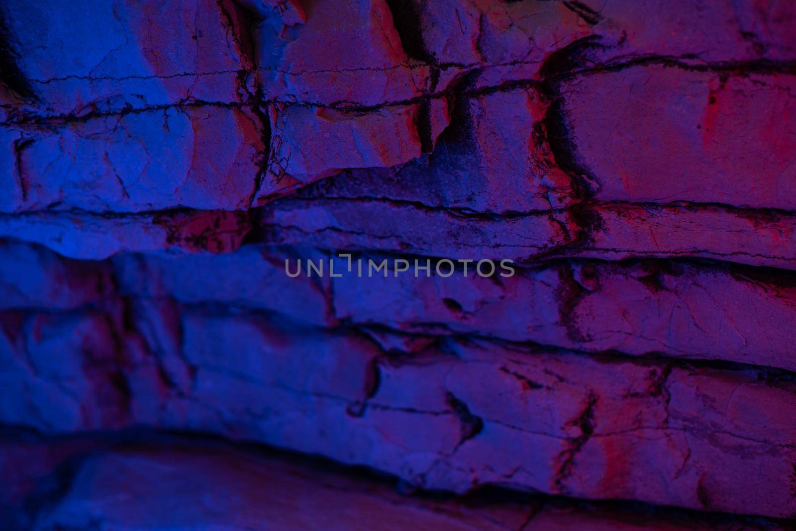 neon texture of granite white rock in bright neon lighting