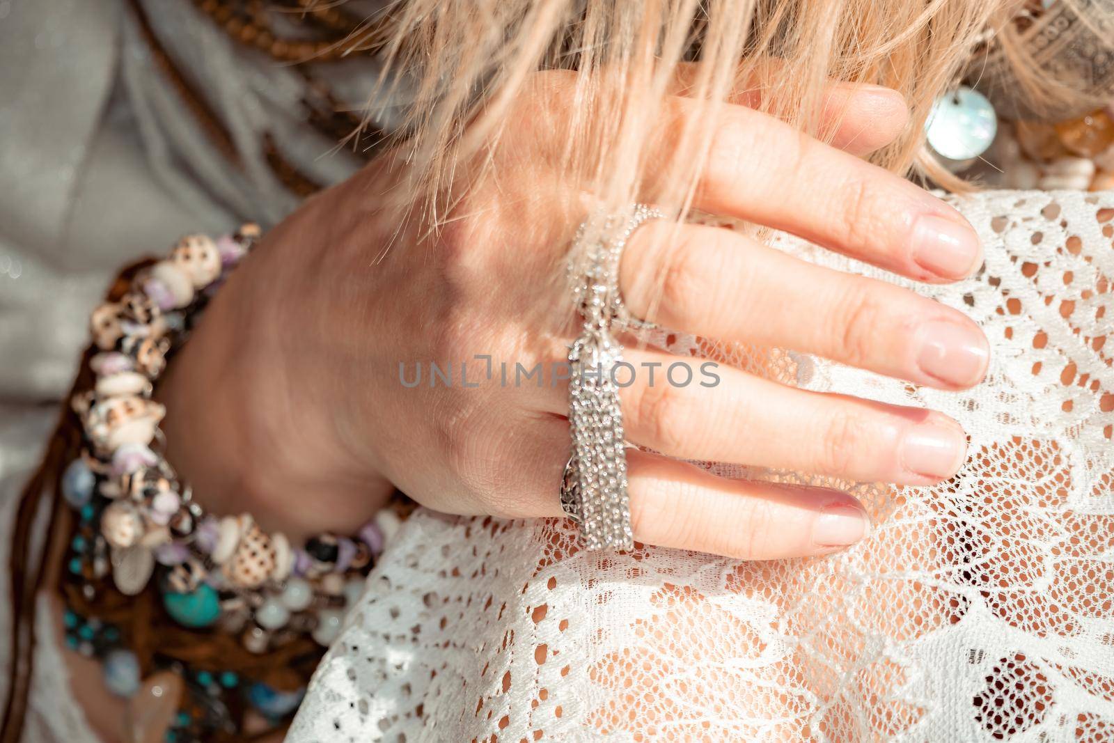 fashionable young model in boho style dress