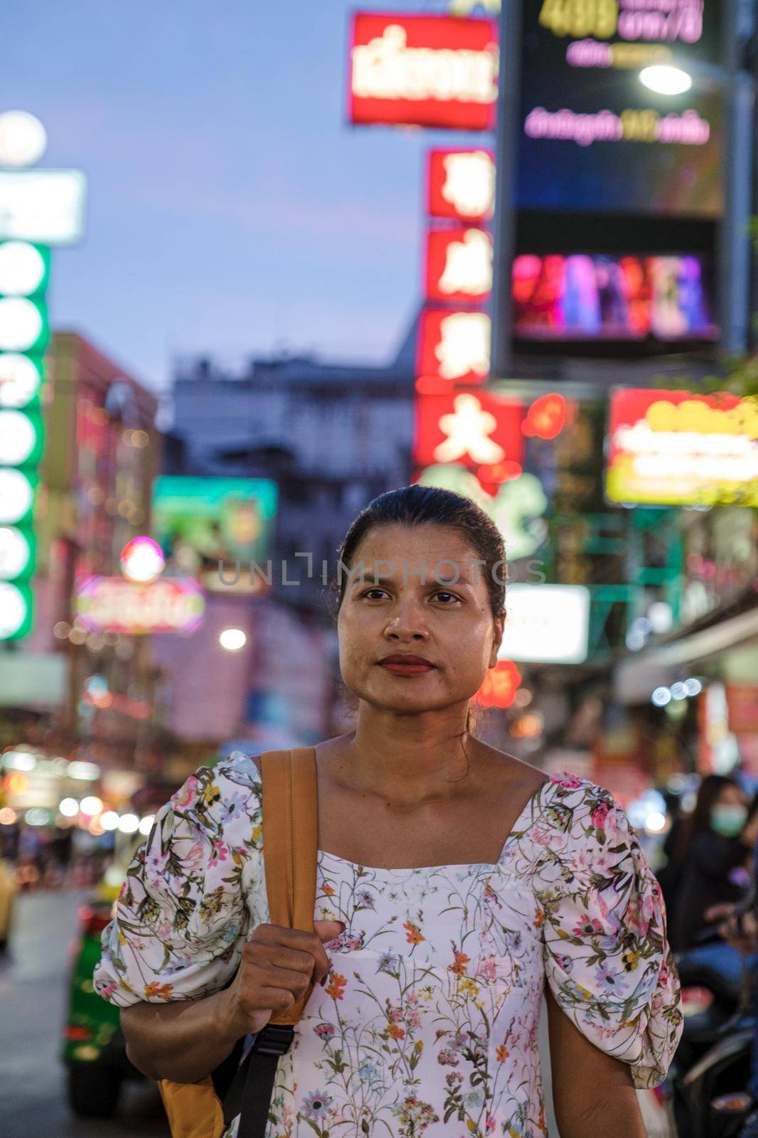 China town Bangkok Thailand, colorful streets of China Town Bangkok.Asian woman with bag, tourist visiting Chinatown