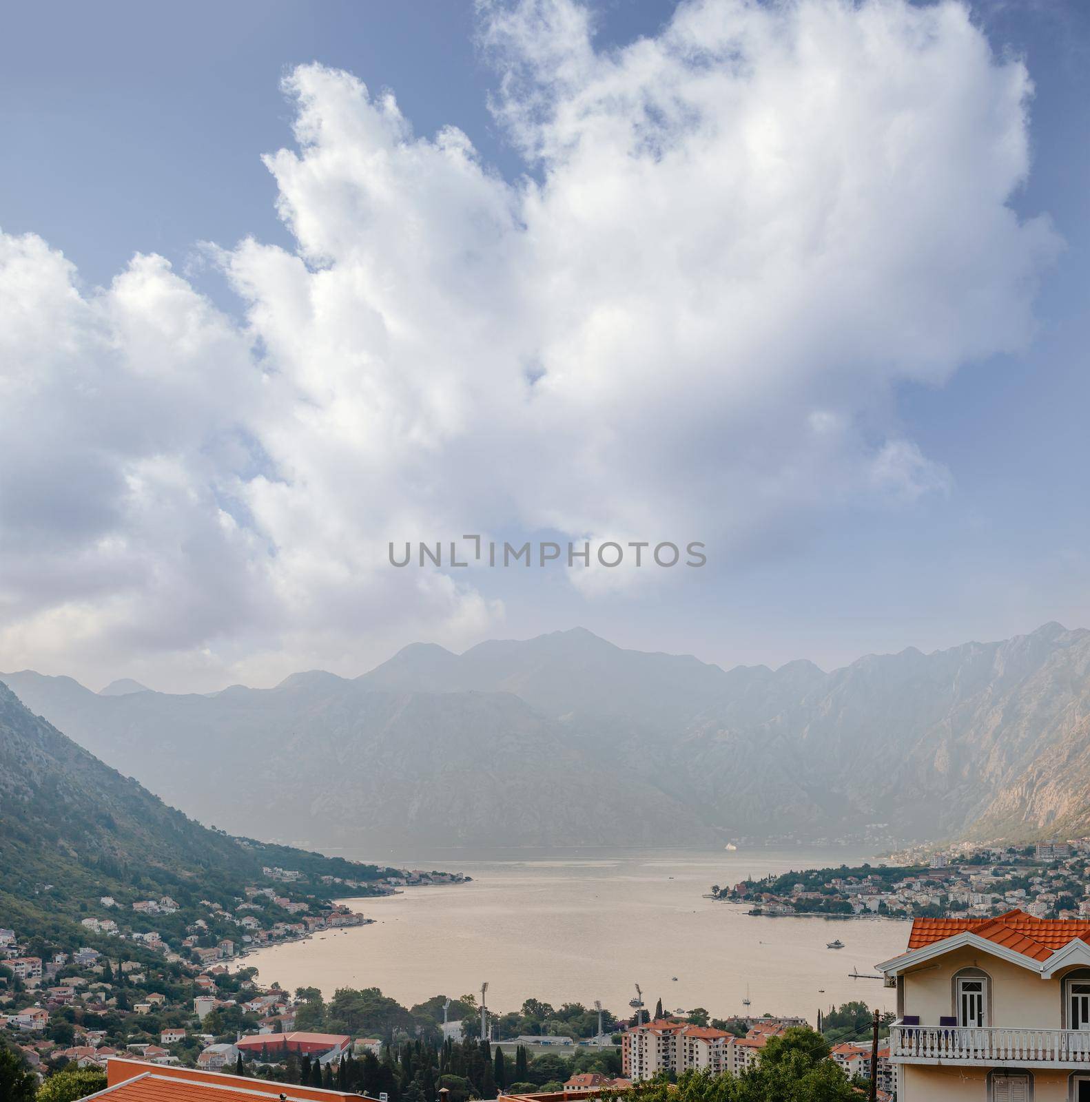 Sunset, beautiful landscape with silhouettes of trees. Travel concept. Montenegro, Kotor Bay. Sunset at Kotor Bay Montenegro. View of the sunset in Boko-Kotor Bay in Montenegro.