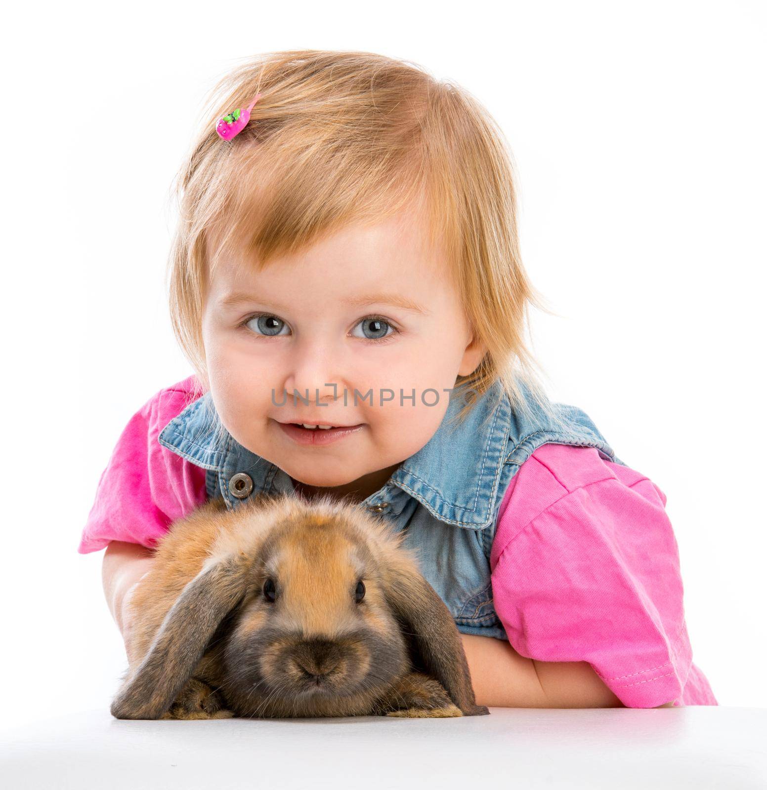 cute little baby and brown easter bunny on white background