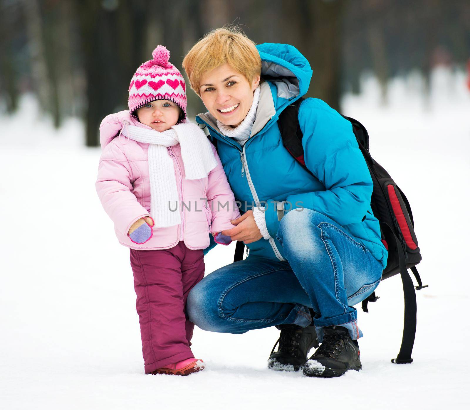 Mother and child on a winter walk