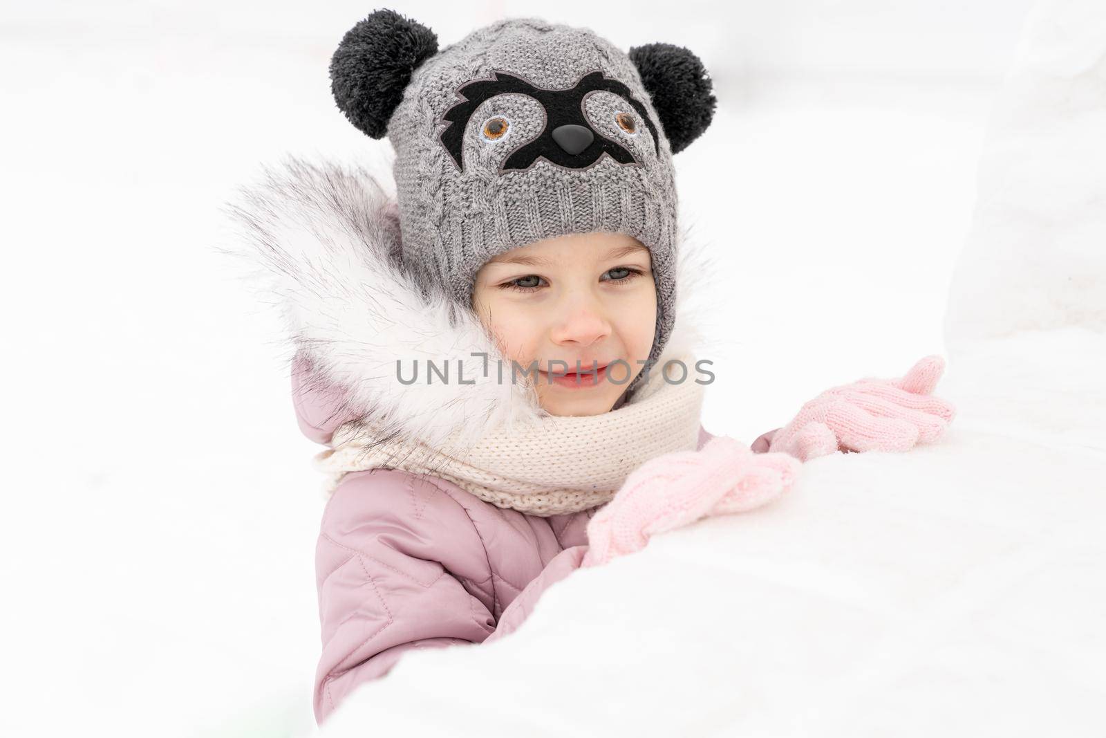 portrait of a happy child on a winter day by Lena_Ogurtsova