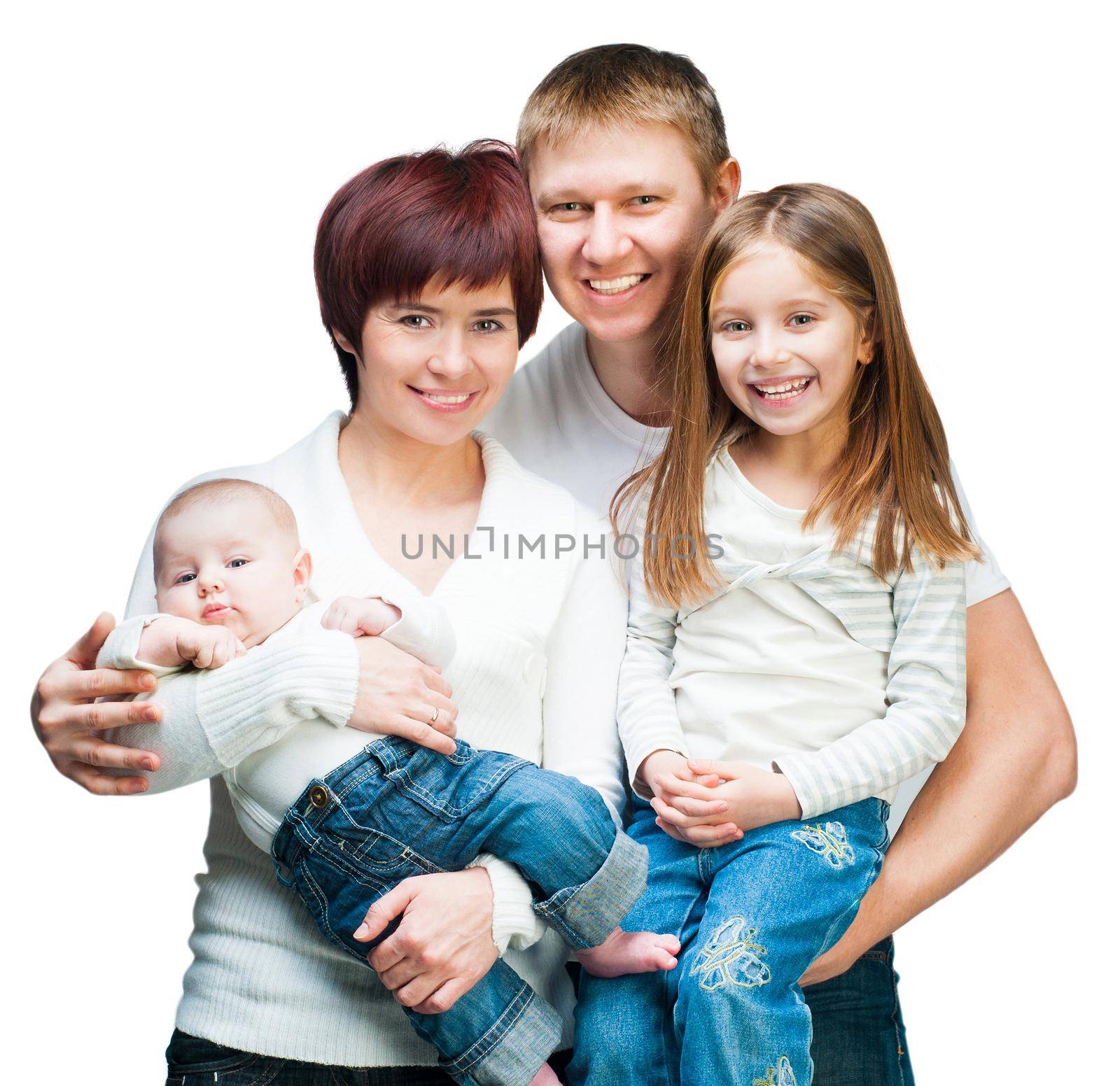 Nice smiling family looking at the camera