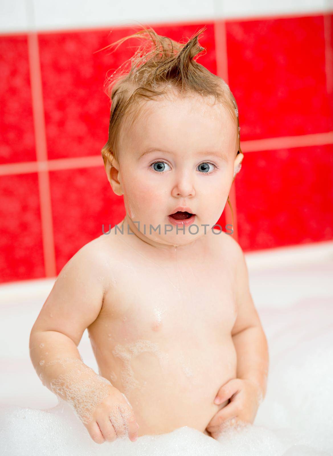 little baby taking a bath
