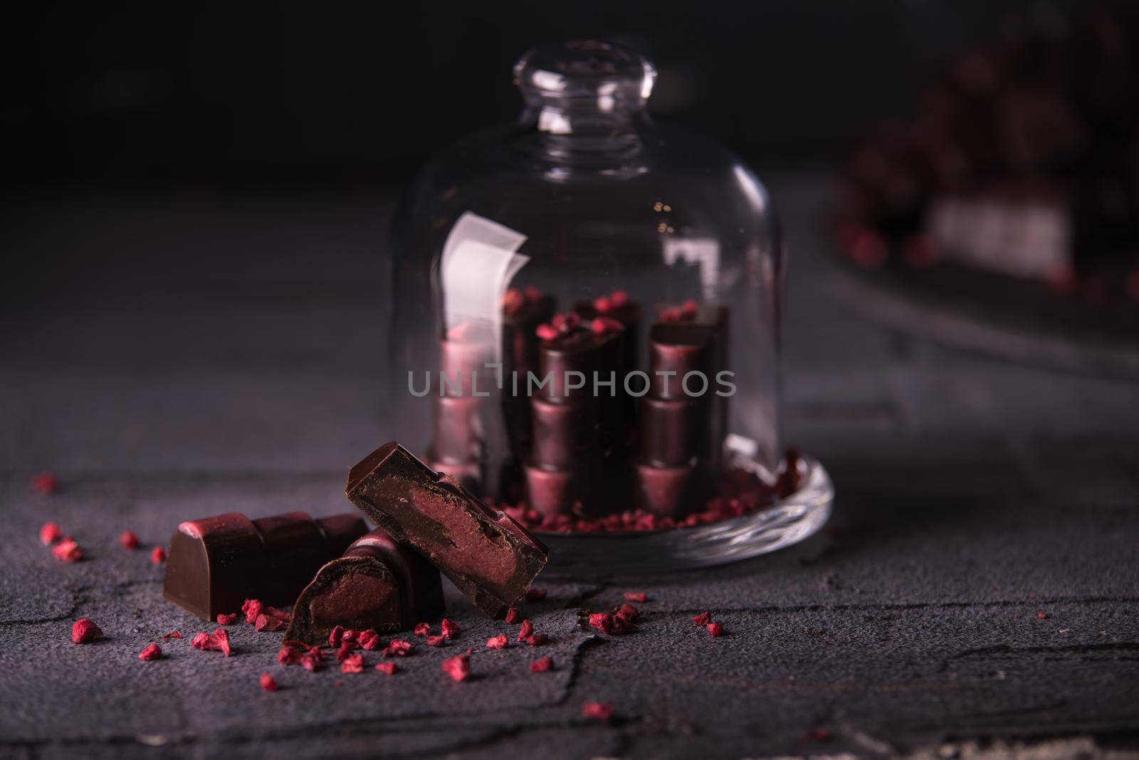 chocolate homemade candies with raspberry fillings by maramorosz