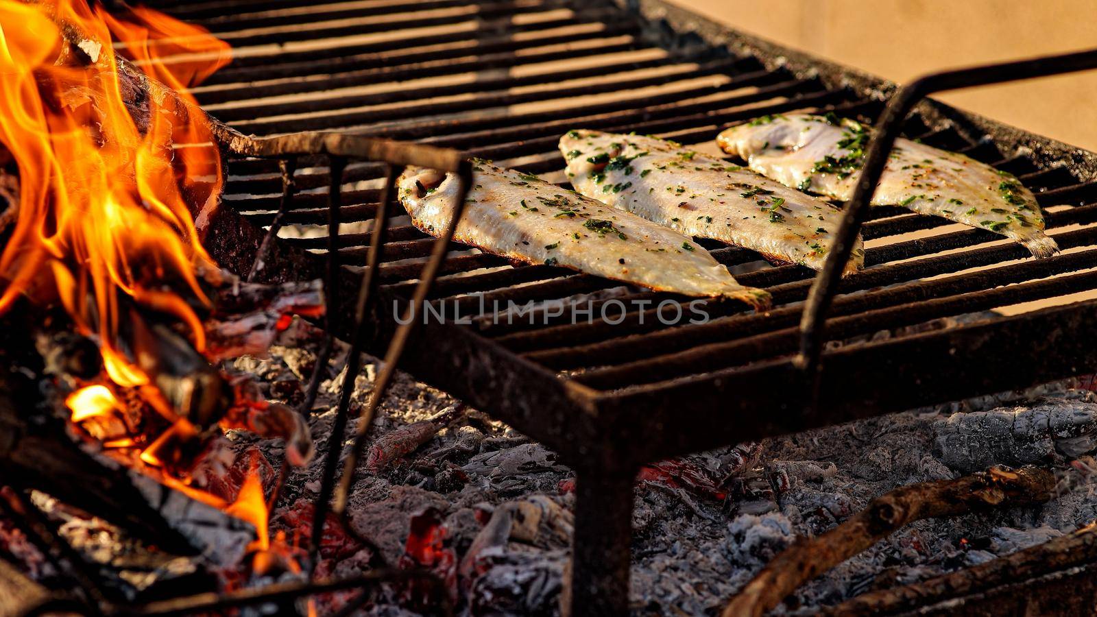 Tasty Grilled sole food detail with smoke