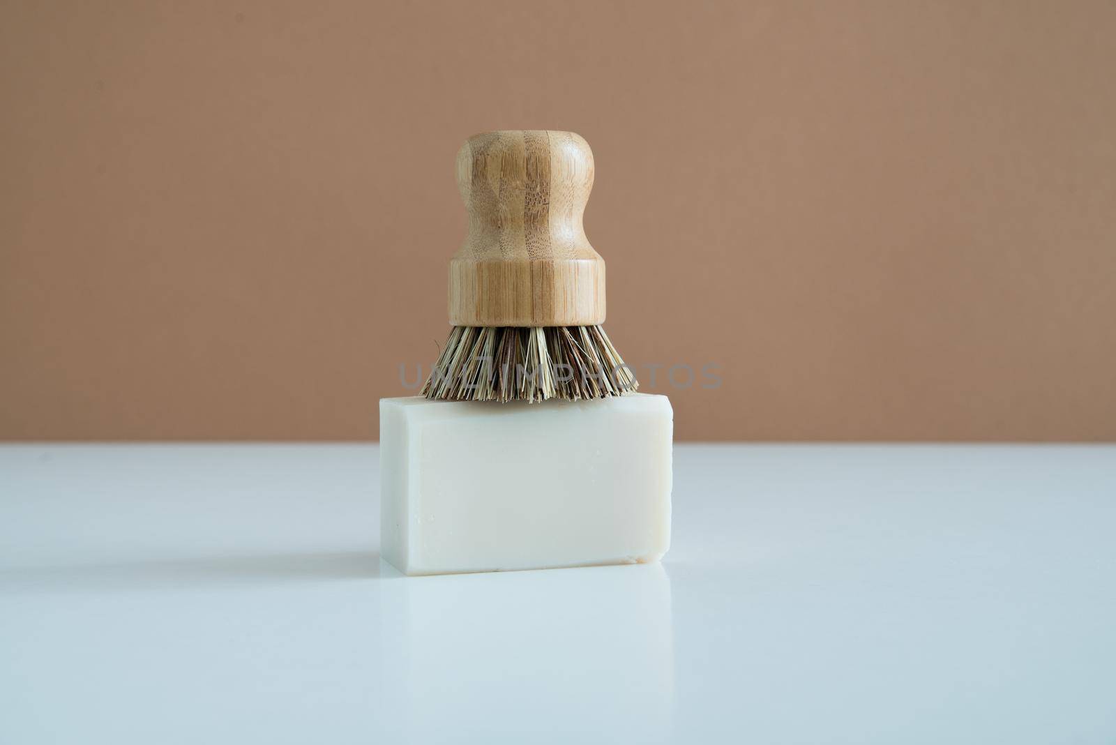 zero waste bamboo brush with soap for dishwashing . High quality photo