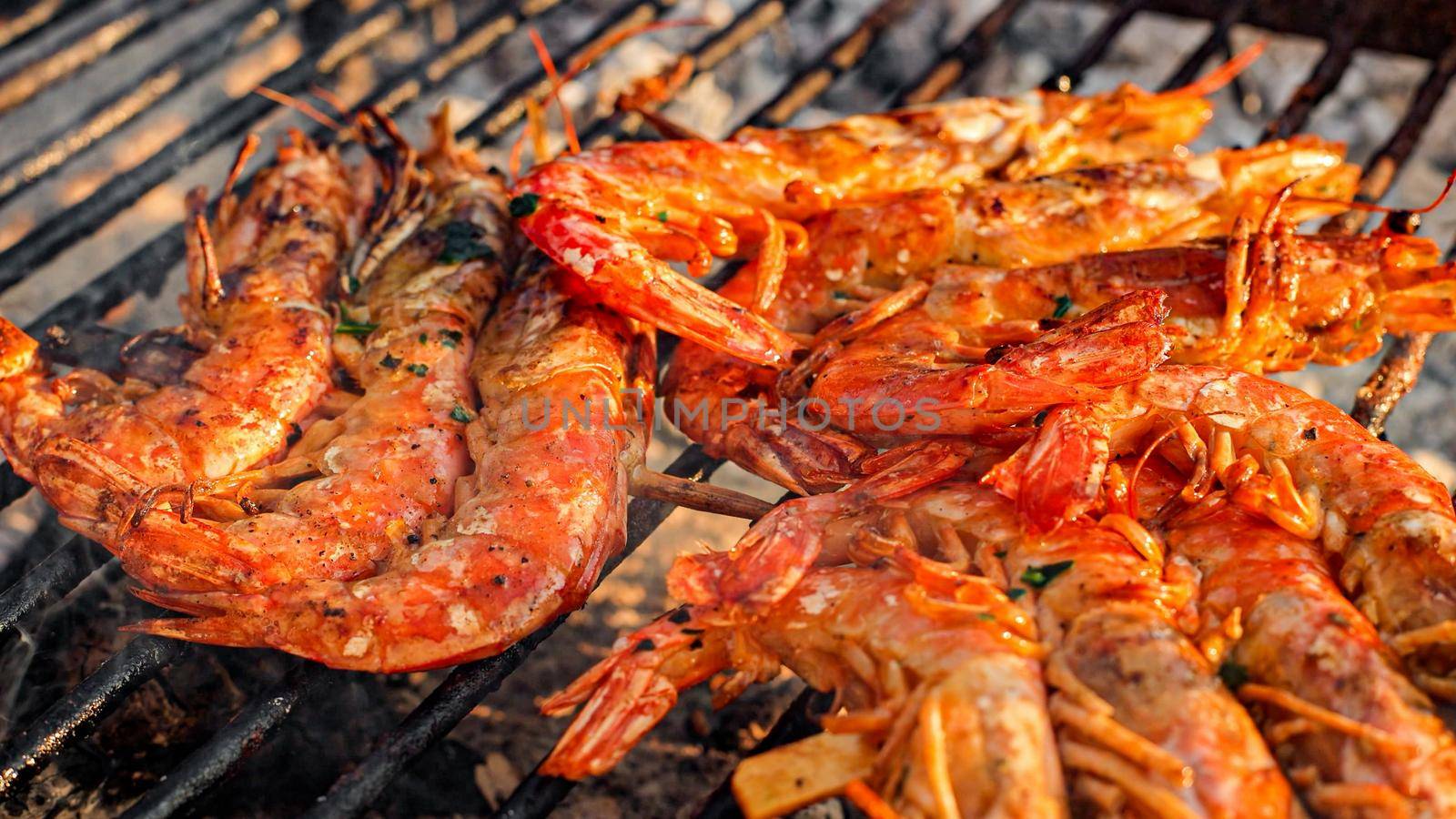 Grilled shrimp (Giant freshwater prawn) grilling with charcoal by pippocarlot