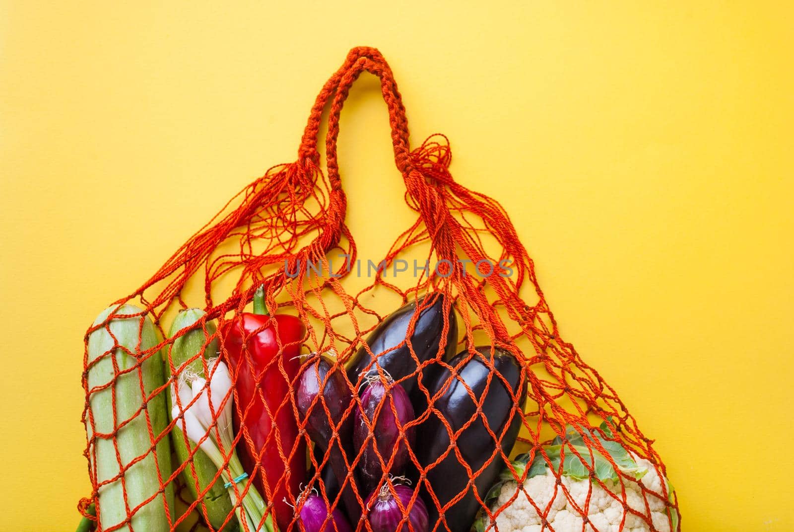 zero waste shopping concept. vegetables in mesh bag without plastic by maramorosz