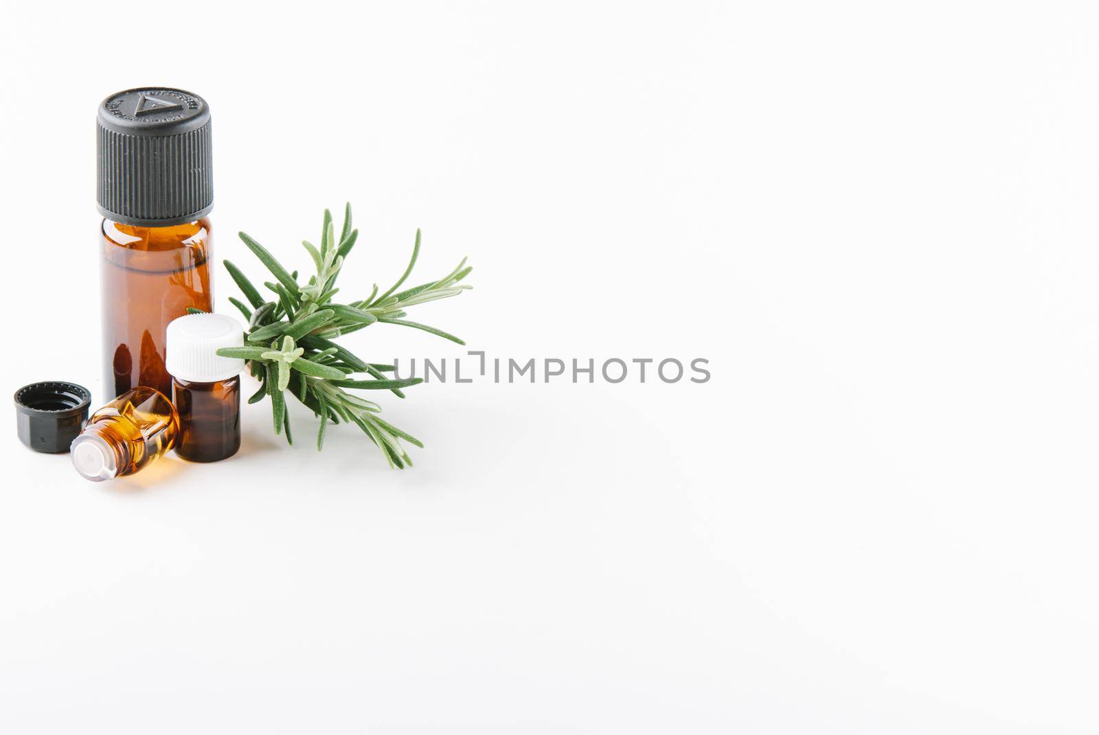 rosemary essential oil with space for text. High quality photo