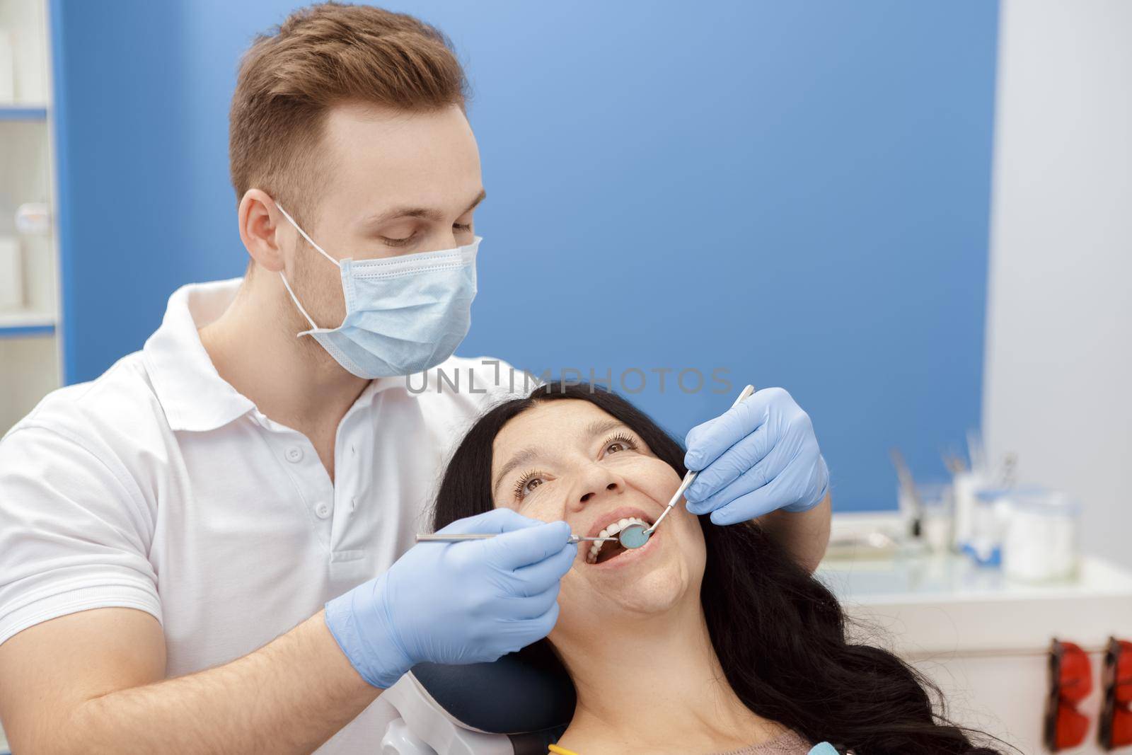 Senior woman visiting dentist at the dental clinic by MAD_Production