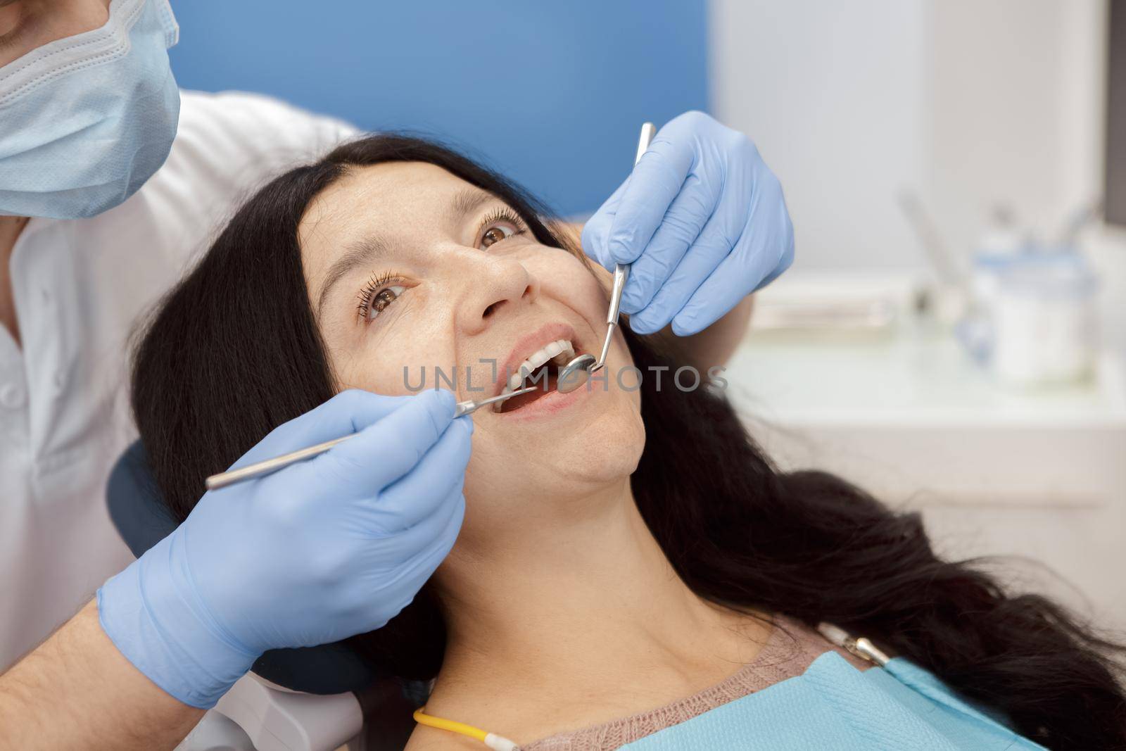 Senior woman visiting dentist at the dental clinic by MAD_Production
