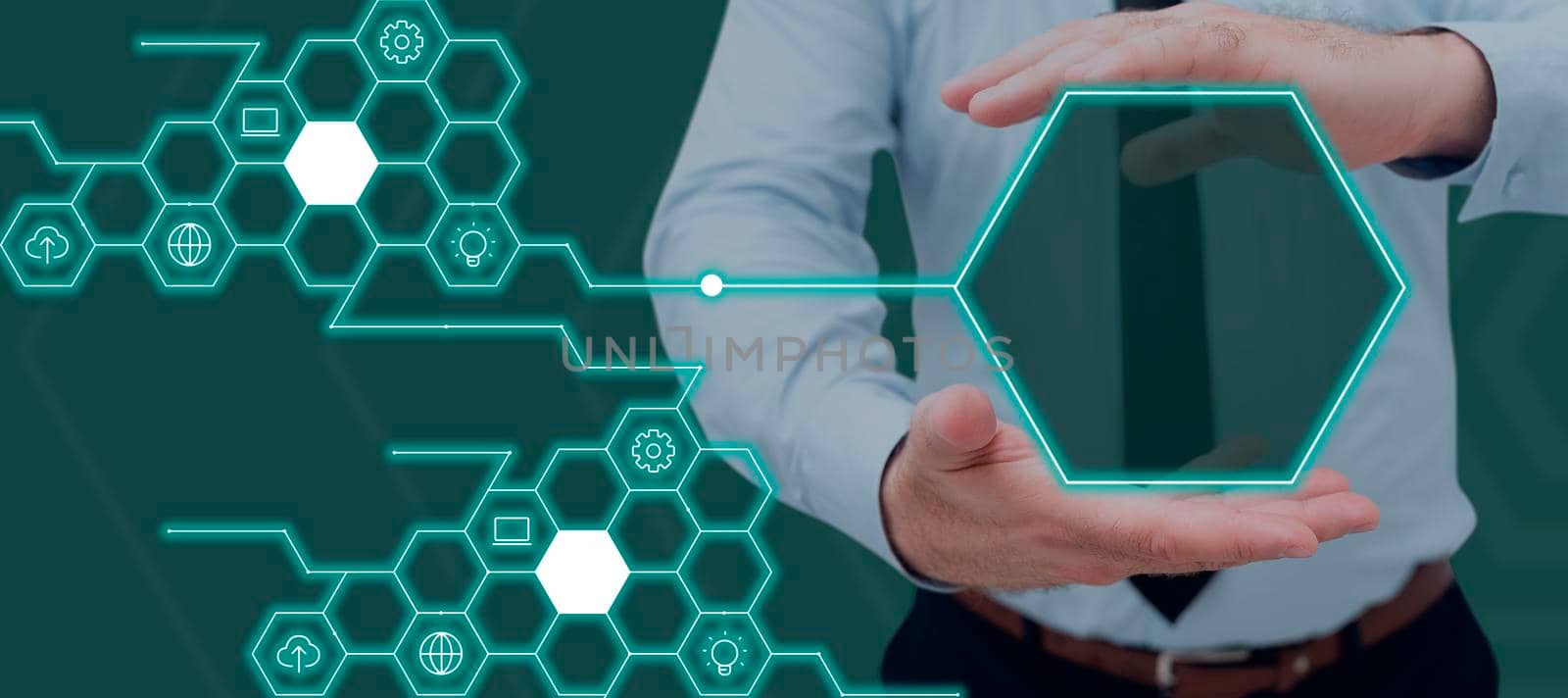 Businessman Holding Digitally Generated Hexagon In Hands Connected To Multiple S. Man Having Graphical Shape With Copy Space For Advertisement And Marketing. by nialowwa