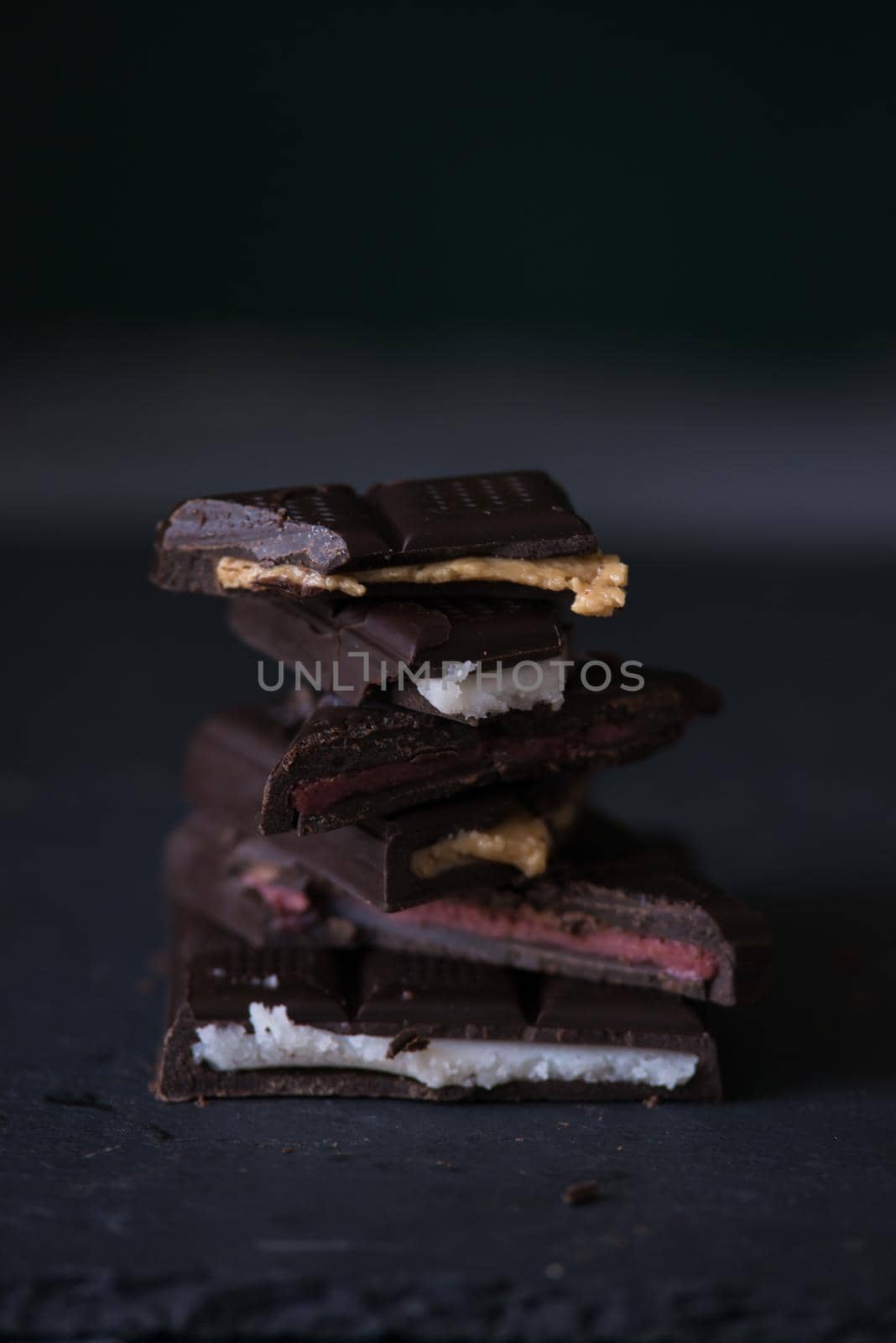 variety of homemade chocolate with different fillings.dark food photo